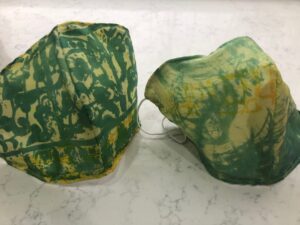 Hand-printed silk face mask (face covering) mainly green