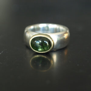 Wide silver ring with tourmaline